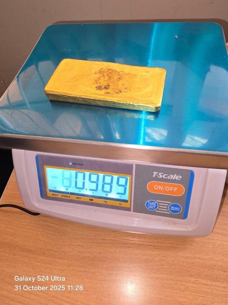 gold-bar-on-weighing-machine